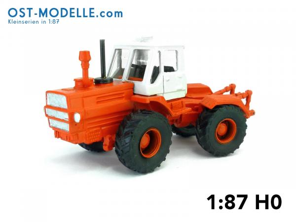 Traktor T150-K rotorange – weiß mit Motorverkleidung